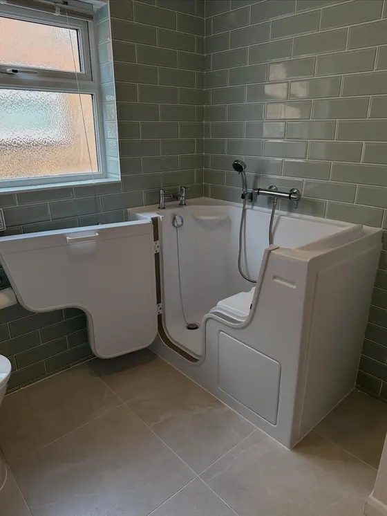 Walk-in bath with a door for easier access